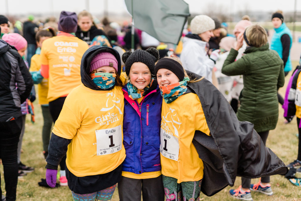 DSC02342 Group of girls smiling during the 2019 Fall 5K