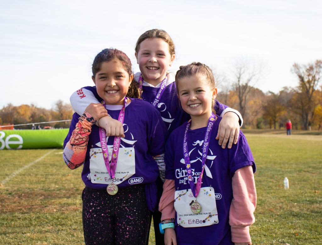 IMG_2040 Group of girls smiling during the 2019 Fall 5K