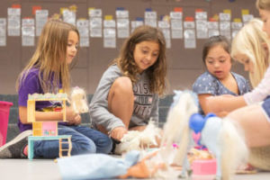 Mitchell-Kids-Klub-600×400-2 Four girls playing at after school care