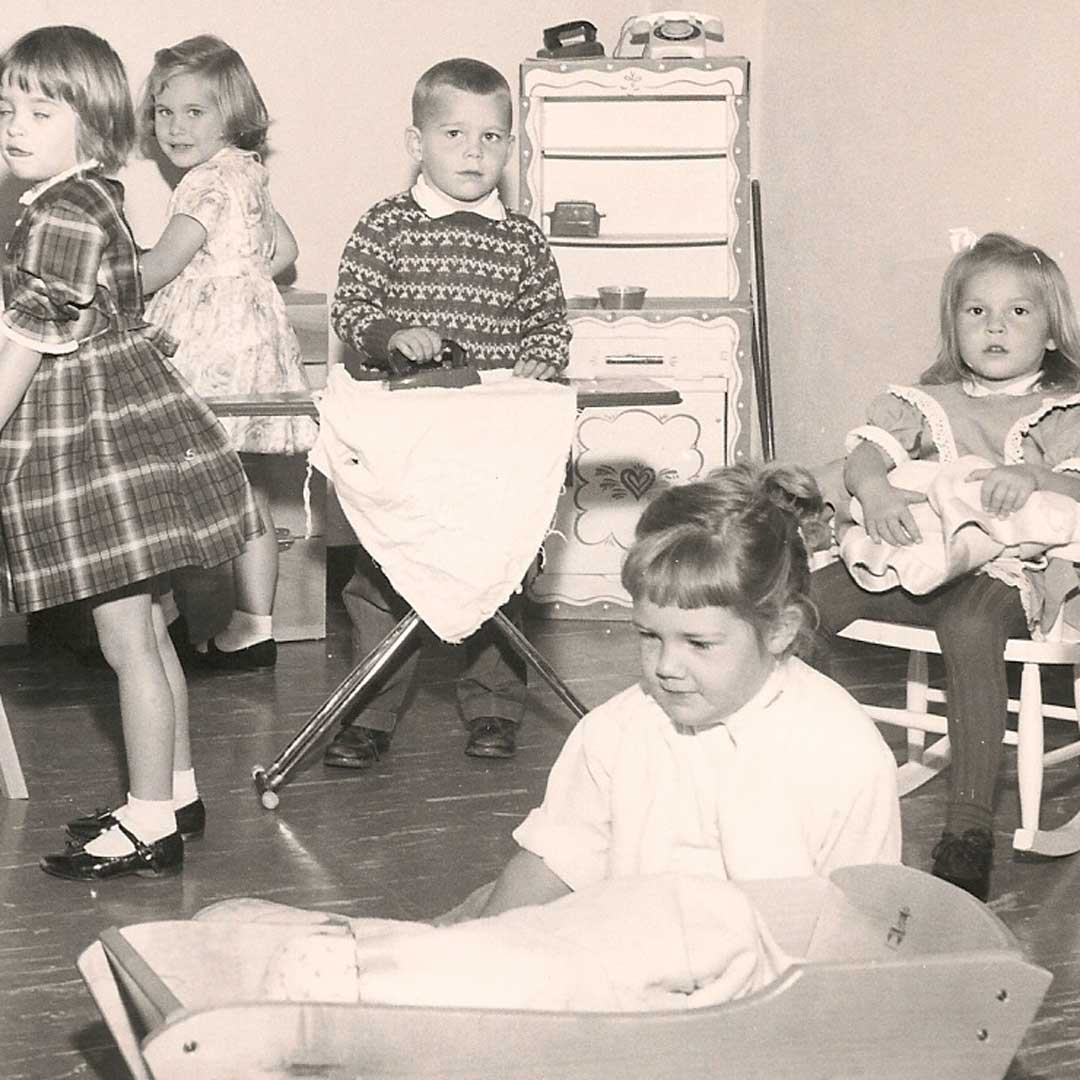 YWCA children playing house in black and white photo